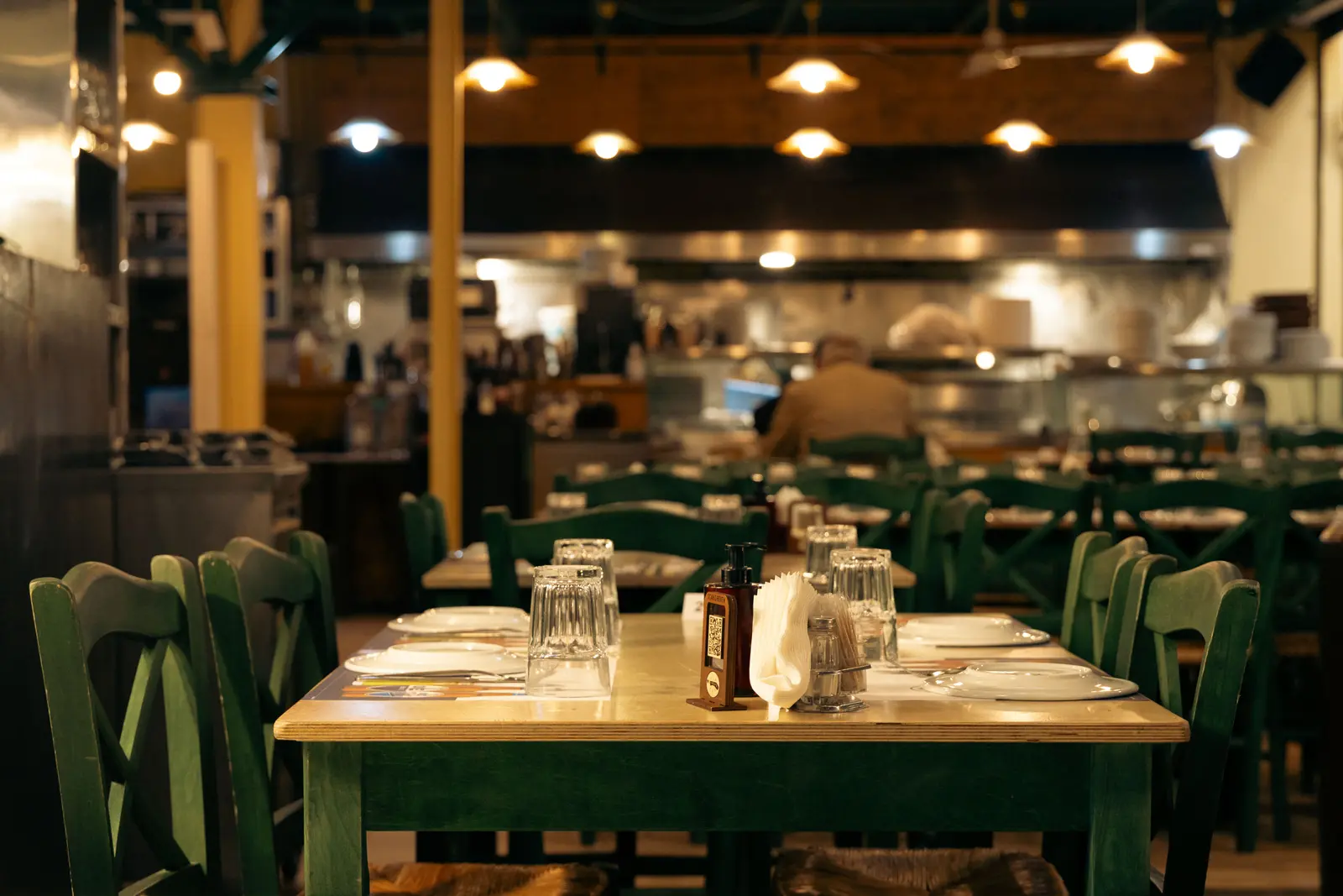 The best cafés to work from in Athens, according to Reddit Warm and inviting Greek café interior with set dining tables in Athens, Greece.