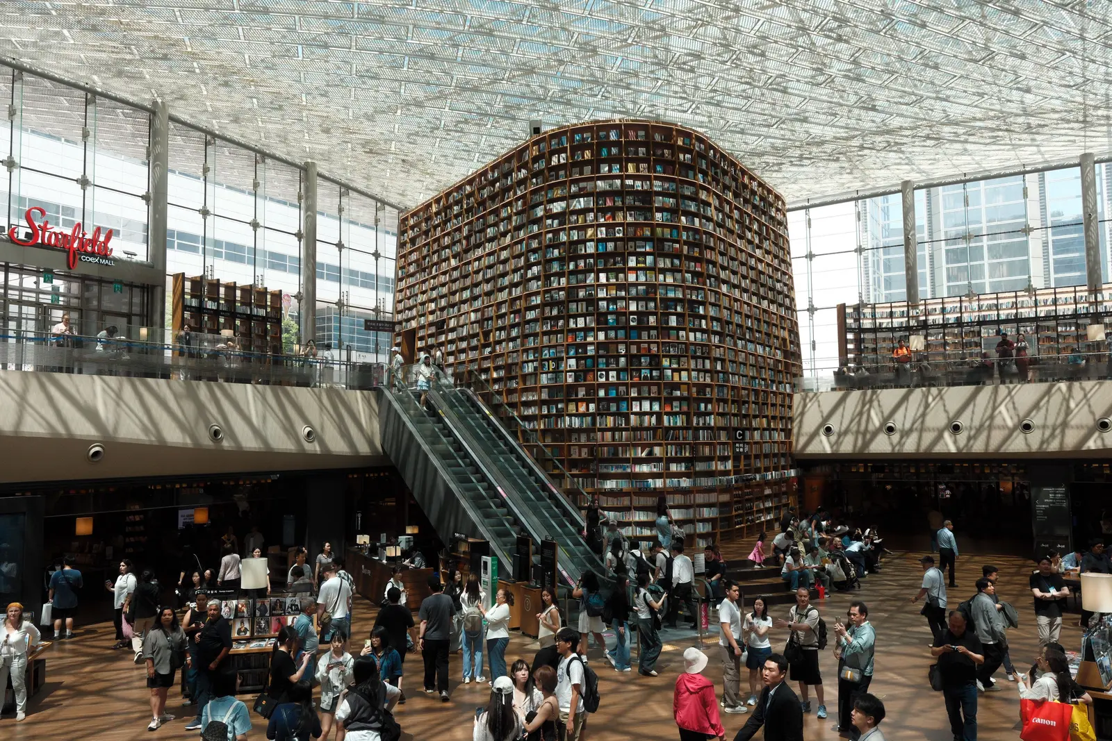 The best places to study in Seoul Visitors explore the vast Starfield Library with its towering bookshelves in Seoul, South Korea.