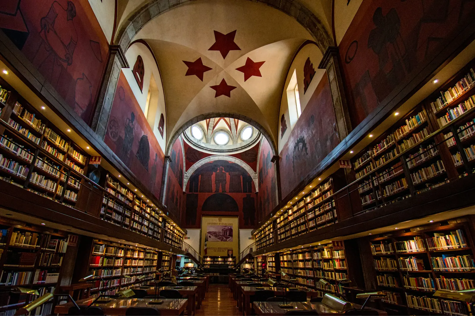 The best libraries to work and study in Guadalajara Interior of a vibrant library in Guadalajara with stunning architecture.