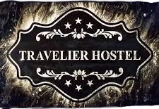 Travelier Hostel logo